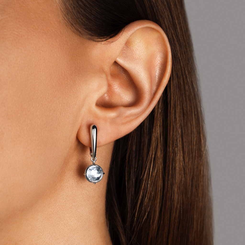 Серьги из белого золота с топазом и бриллиантом