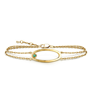 Браслет декоративный из желтого золота с изумрудом