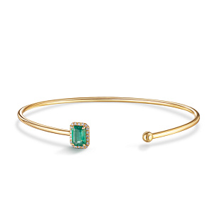 Браслет жесткий из желтого золота с изумрудом