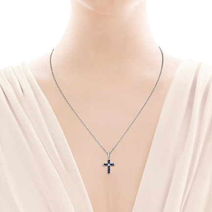 Крест из белого золота с сапфирами и бриллиантом