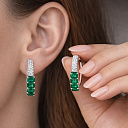 Серьги из белого золота с бриллиантами, изумрудами