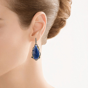 Серьги с английским замком из желтого золота с корундом