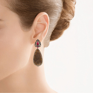 Серьги из желтого золота с корундом