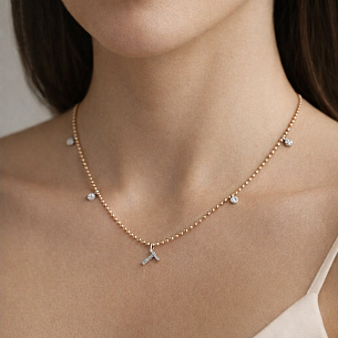 Колье из комбинированного золота с бриллиантом