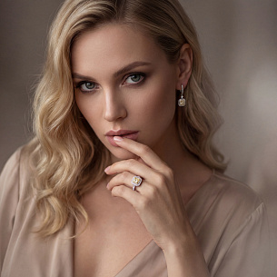 Серьги с английским замком из белого золота с бриллиантом