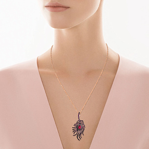 Брошь из красного золота с сапфиром