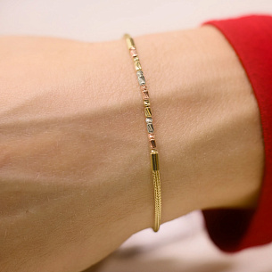 Браслет из комбинированного золота с фианитом