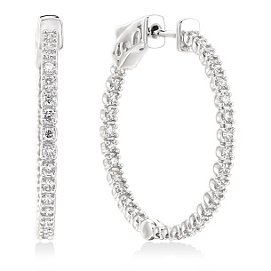 Серьги из белого золота с бриллиантом