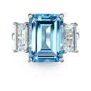 Кольцо из белого золота с аквамаринами, топазом