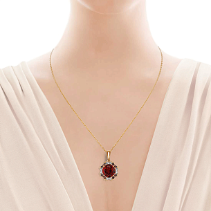 Подвеска из красного золота с бриллиантами и гранатом