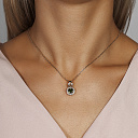 Подвеска из желтого золота с молдавитом, сапфирами